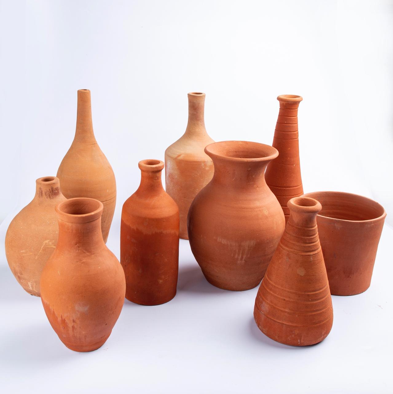 Set of 9 Pottery Items